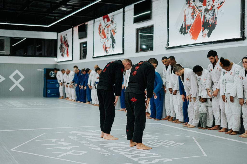 Jiu Jitsu students line up to bow in for class.